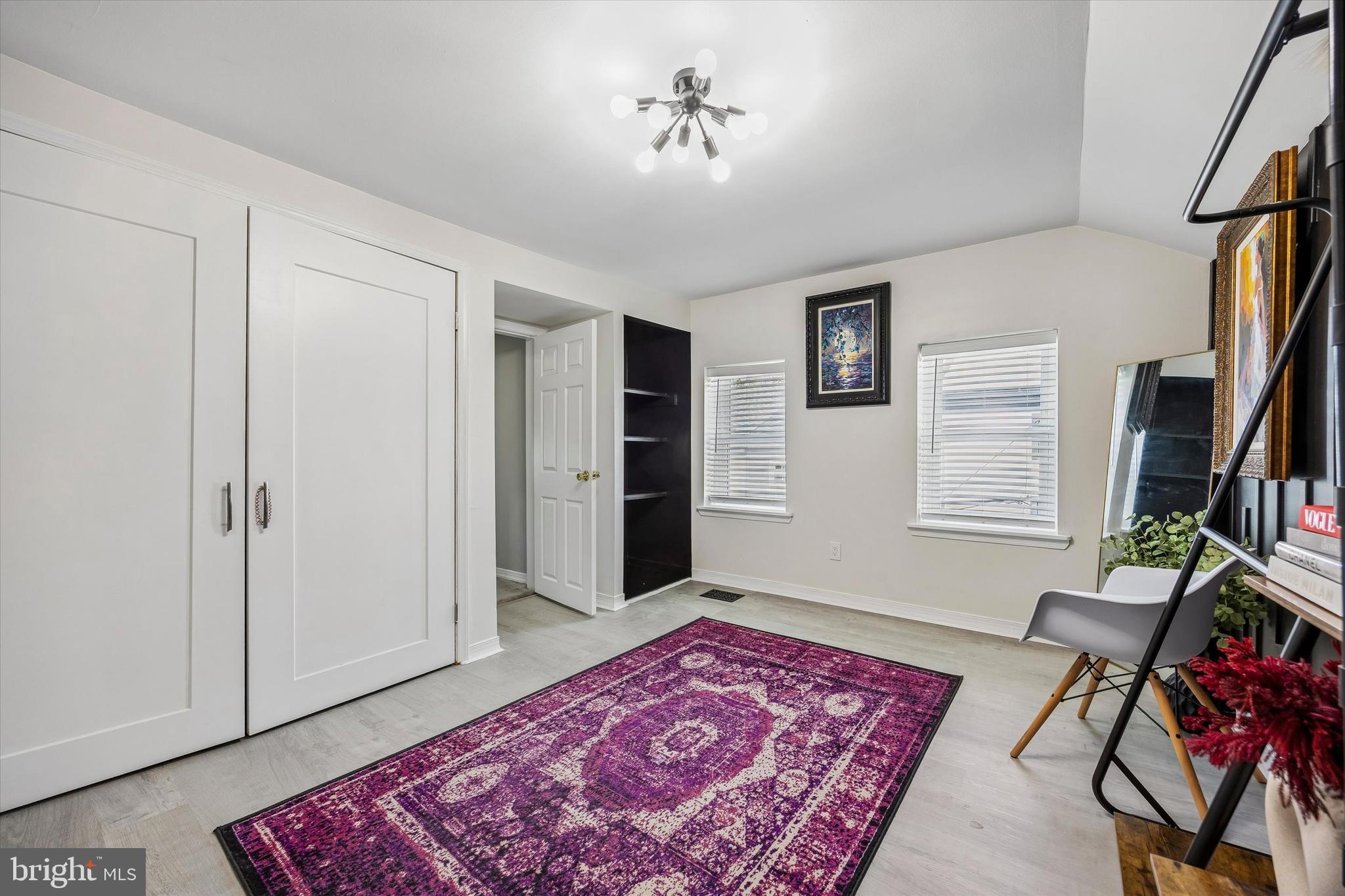 145 Conarroe Street Philadelphia, PA 19127 - Photo 22 of 28 a living room with furniture and a rug