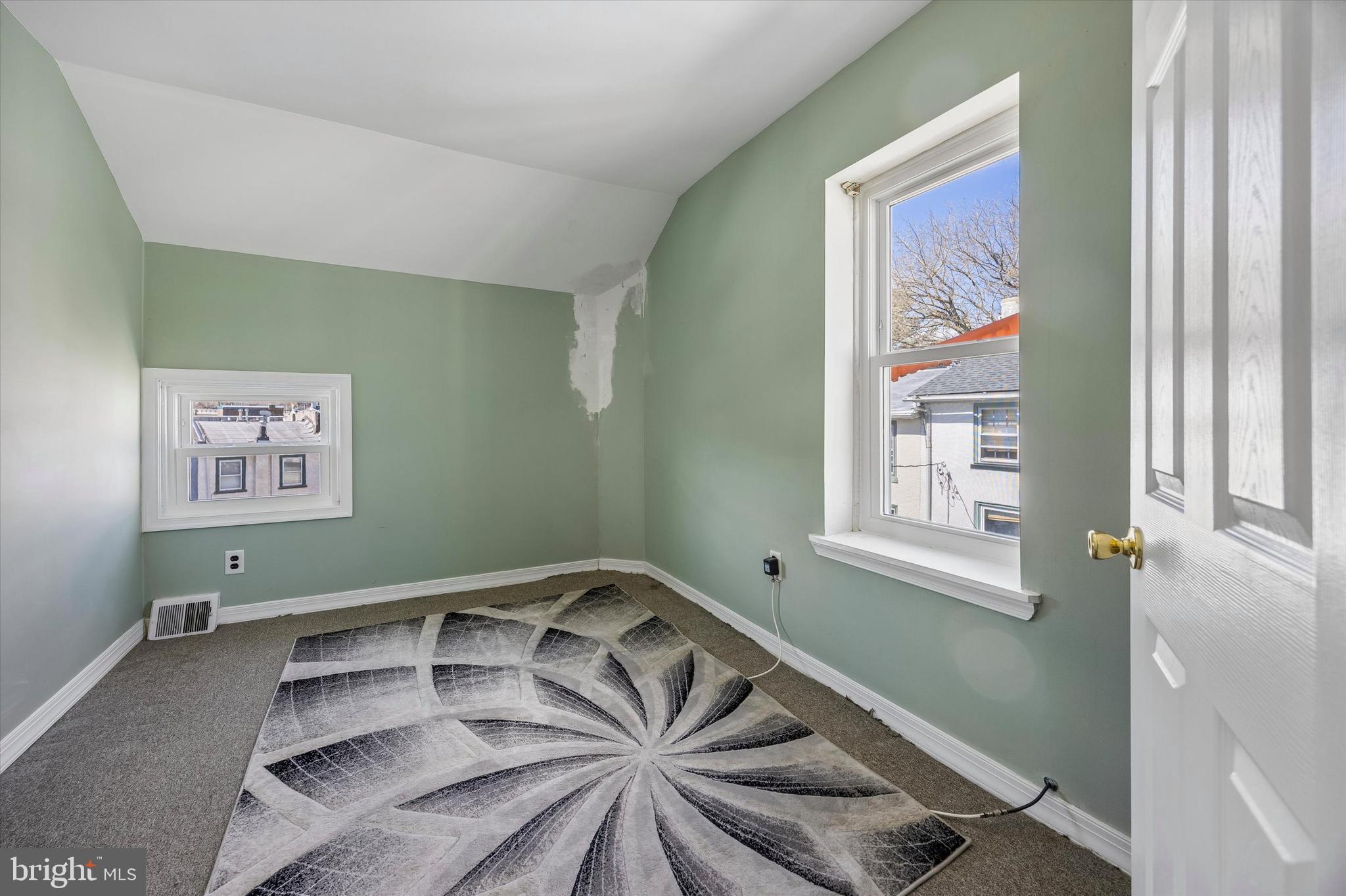 145 Conarroe Street Philadelphia, PA 19127 - Photo 23 of 28 a view of a room with window and furniture