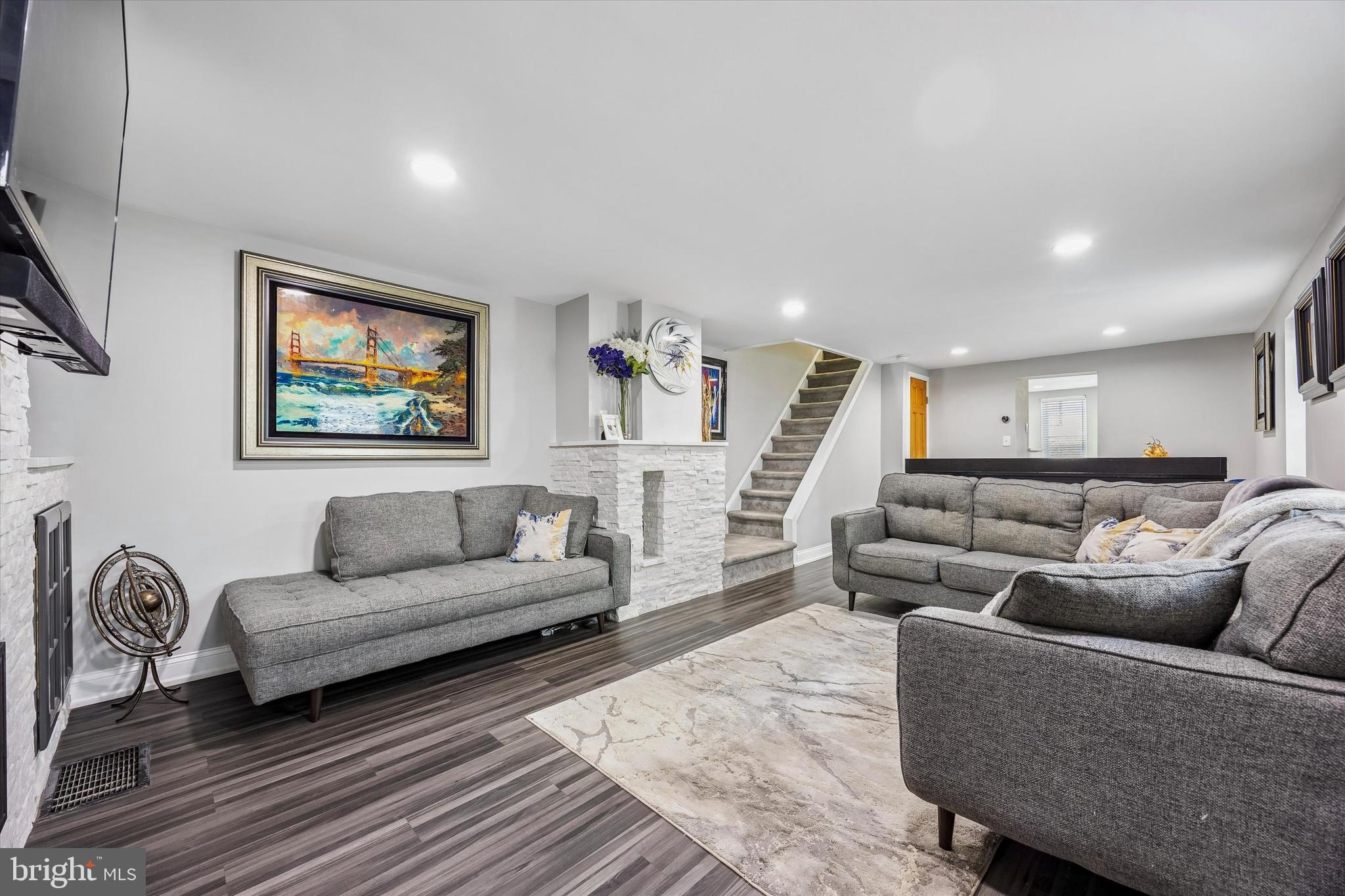 145 Conarroe Street Philadelphia, PA 19127 - Photo 5 of 28 a living room with furniture and a view of kitchen