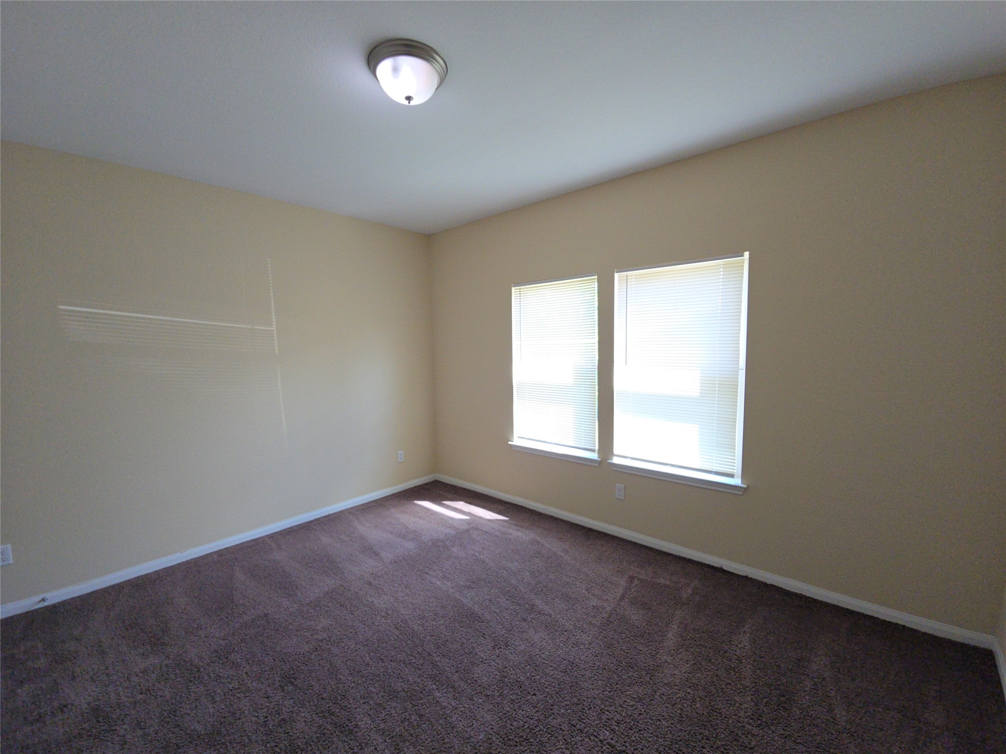 8205 Claiborne Street Houston, TX 77078 - Photo 18 of 26 an empty room with a window