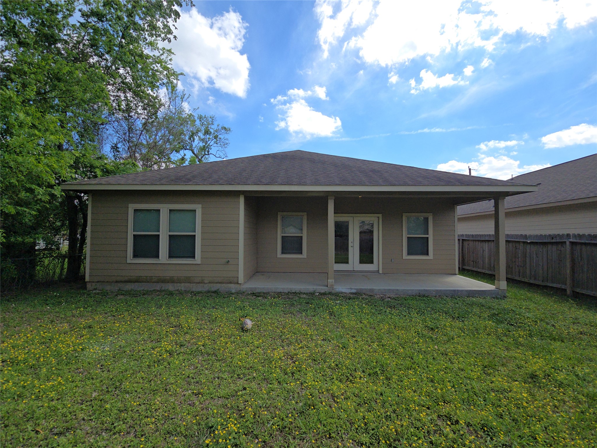 8205 Claiborne Street Houston, TX 77078 - Photo 24 of 26 a view of a house with a yard