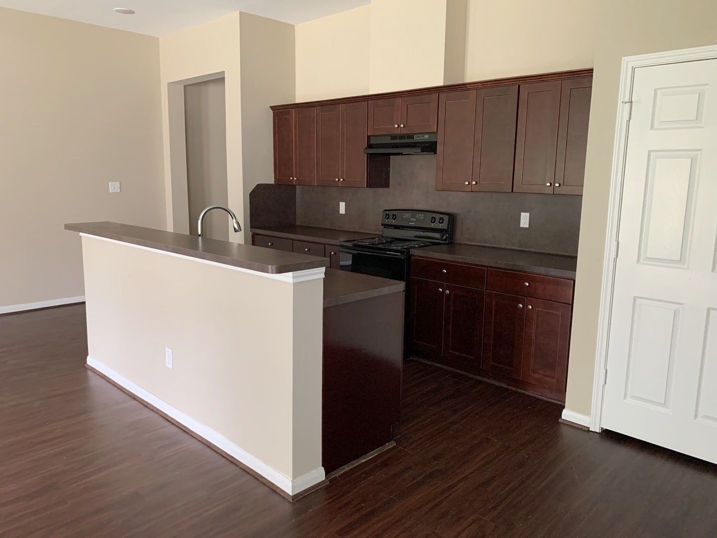 8205 Claiborne Street Houston, TX 77078 - Photo 3 of 26 a kitchen with stainless steel appliances granite countertop a sink and a stove