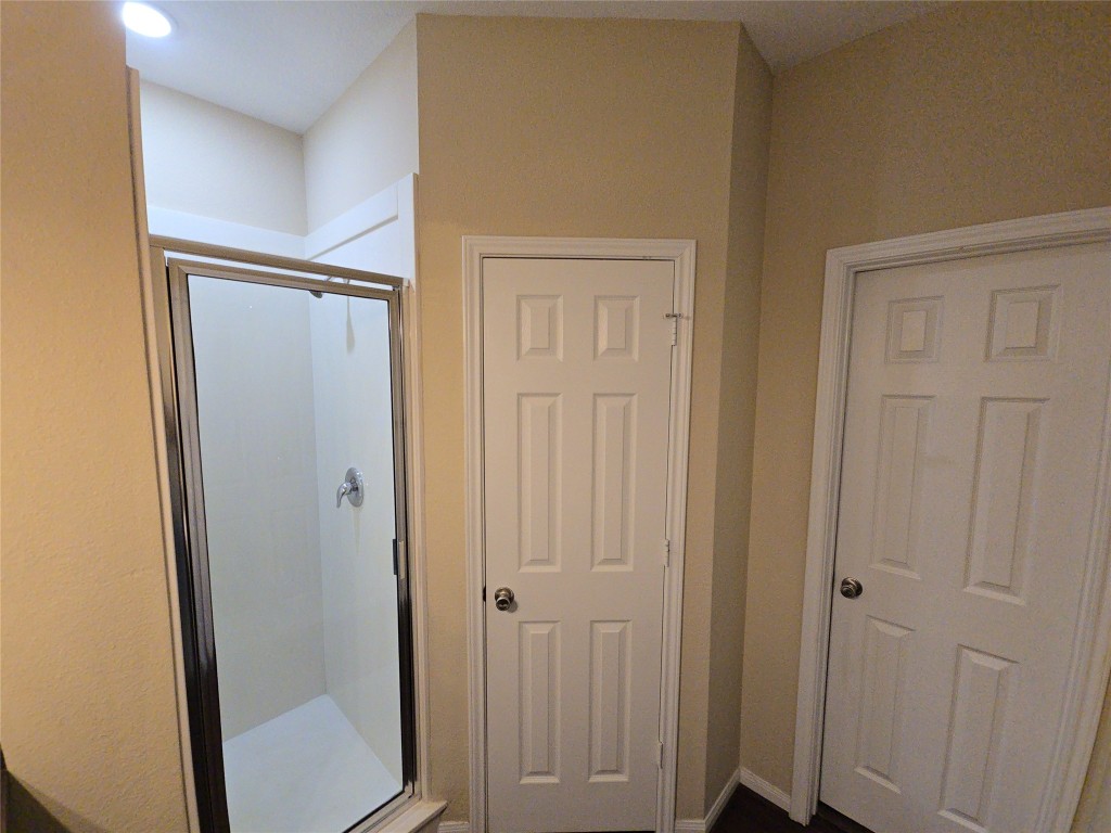 8205 Claiborne Street Houston, TX 77078 - Photo 9 of 26 a view of a bathroom with a sink and a mirror