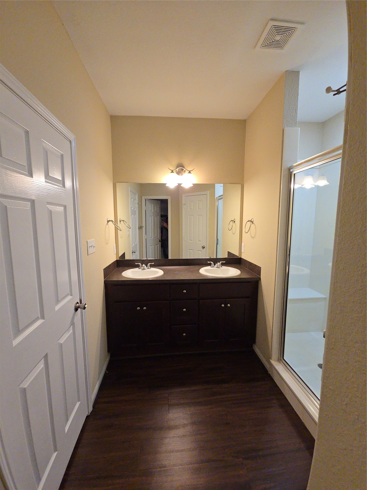 8205 Claiborne Street Houston, TX 77078 - Photo 10 of 26 a room with a sink a mirror and a shower