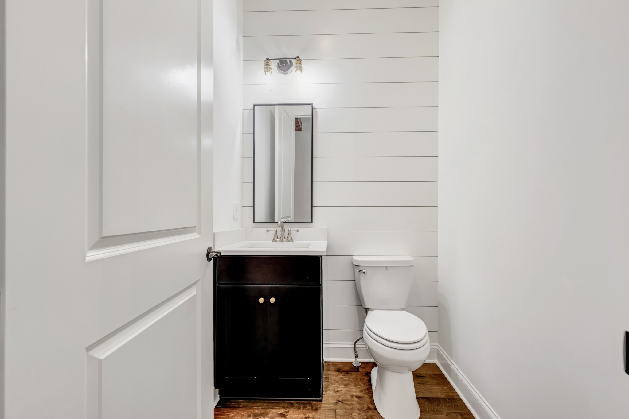 7483 Liberty Road Fairview, TN 37062 - Photo 12 of 65 a bathroom with a toilet and a sink