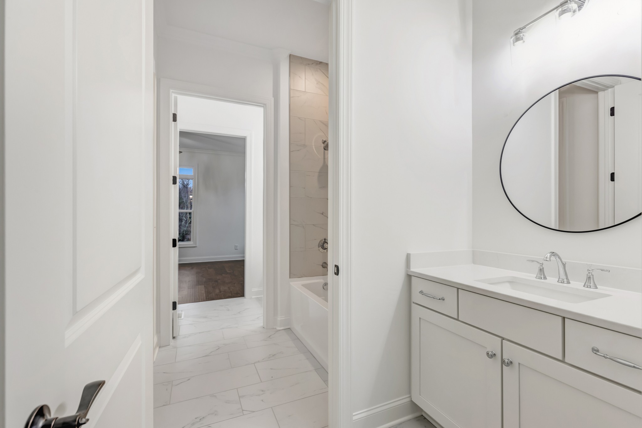 7483 Liberty Road Fairview, TN 37062 - Photo 37 of 65 a bathroom with a sink and a mirror