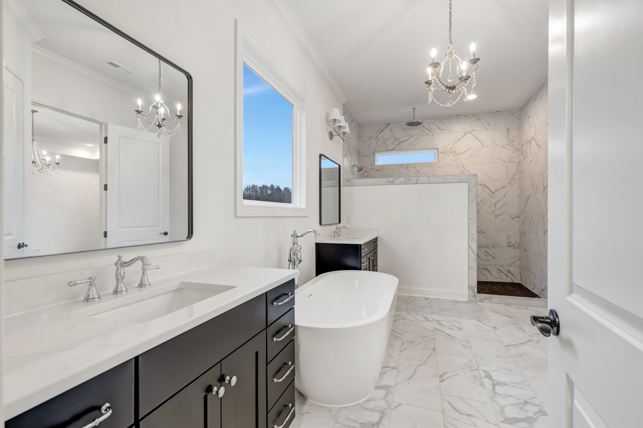 7483 Liberty Road Fairview, TN 37062 - Photo 41 of 65 a bathroom with a sink toilet a mirror and shower