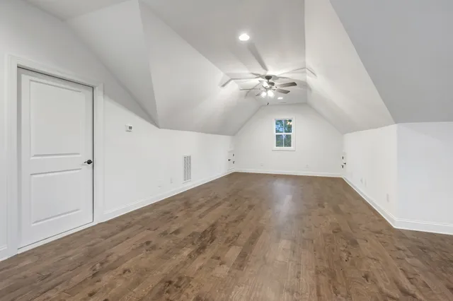 a view of a tree in a yard