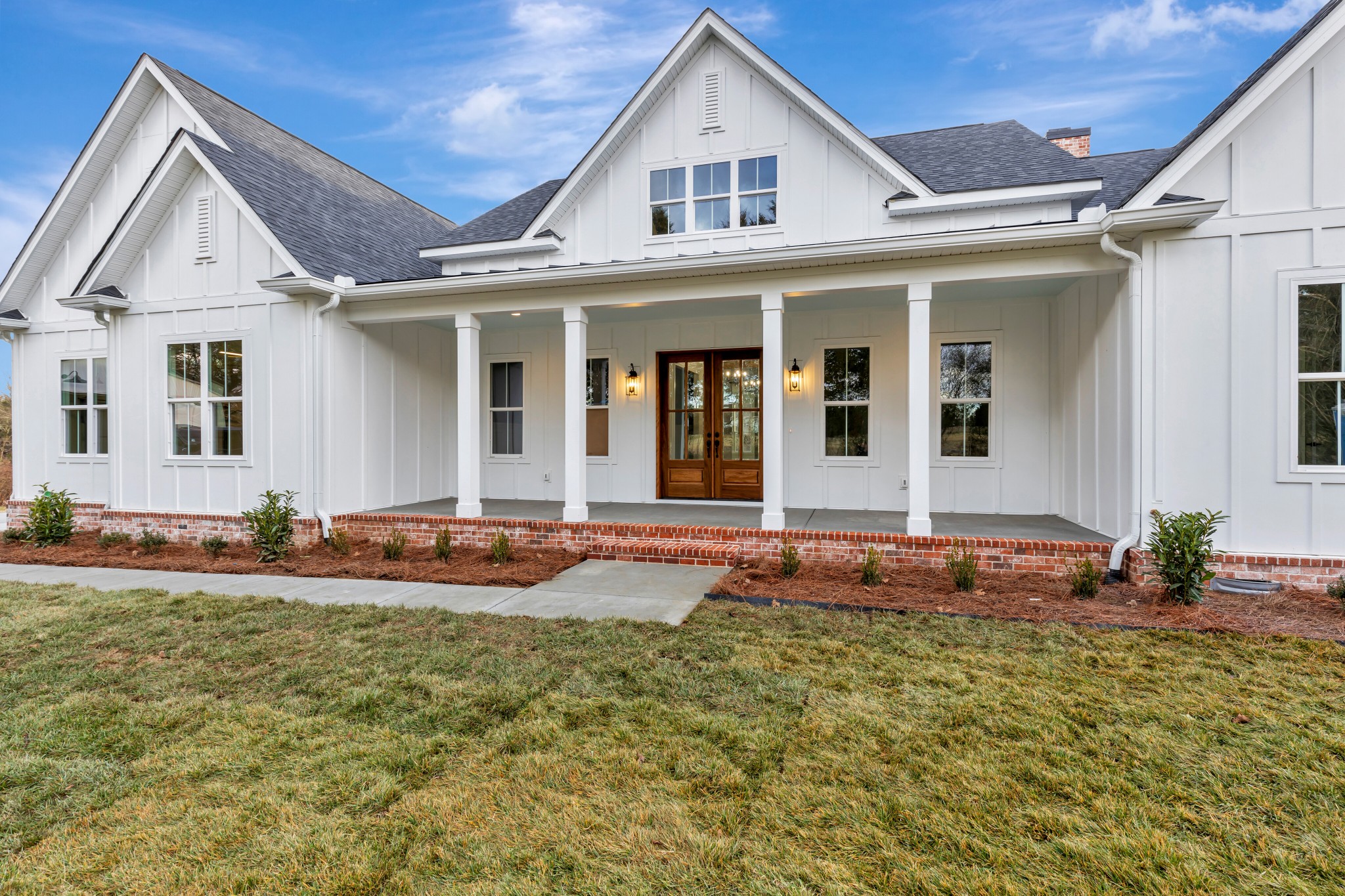 7483 Liberty Road Fairview, TN 37062 - Photo 5 of 65 a front view of a house with garden