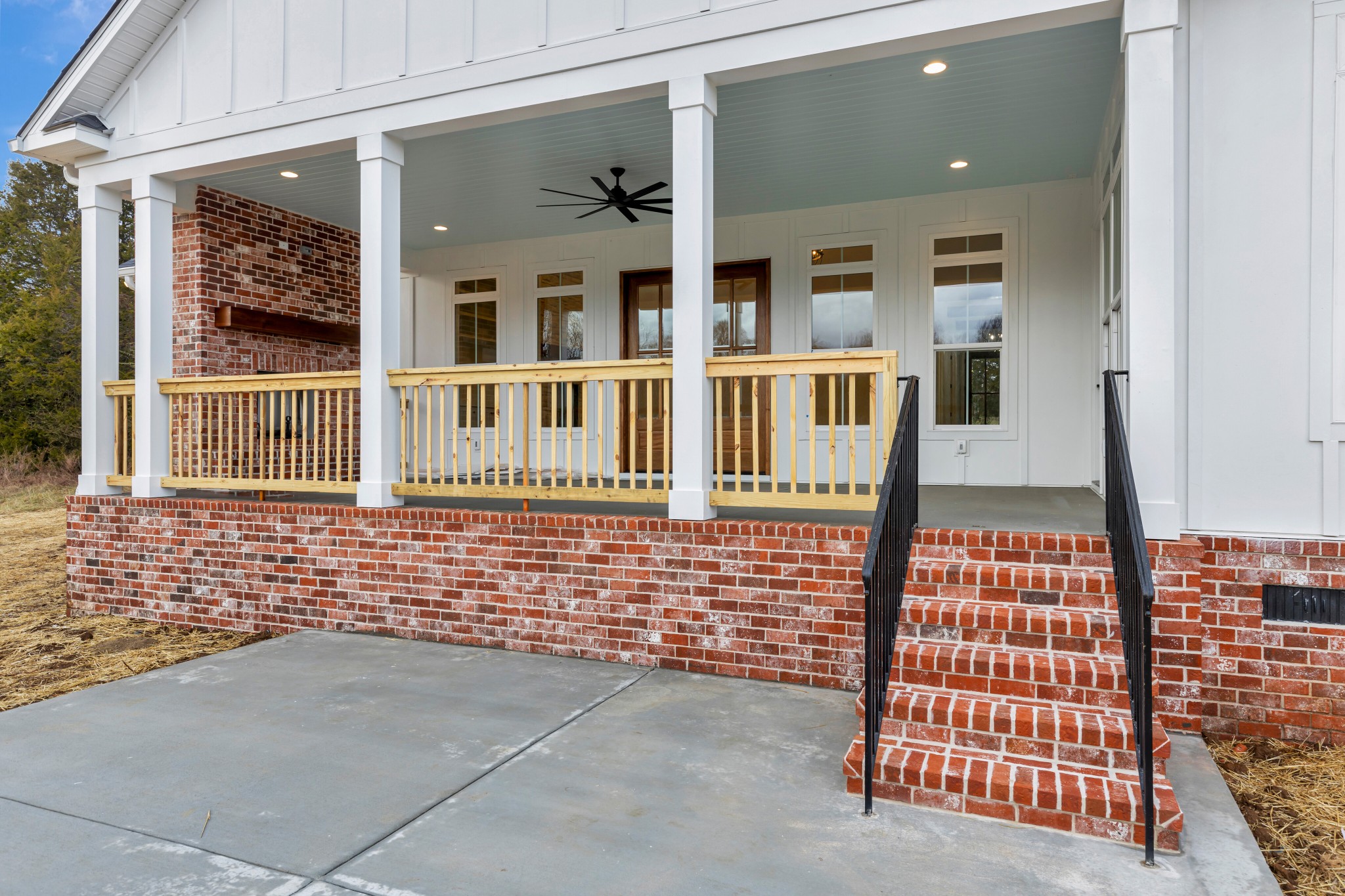 7483 Liberty Road Fairview, TN 37062 - Photo 52 of 65 front view of a brick house with large windows