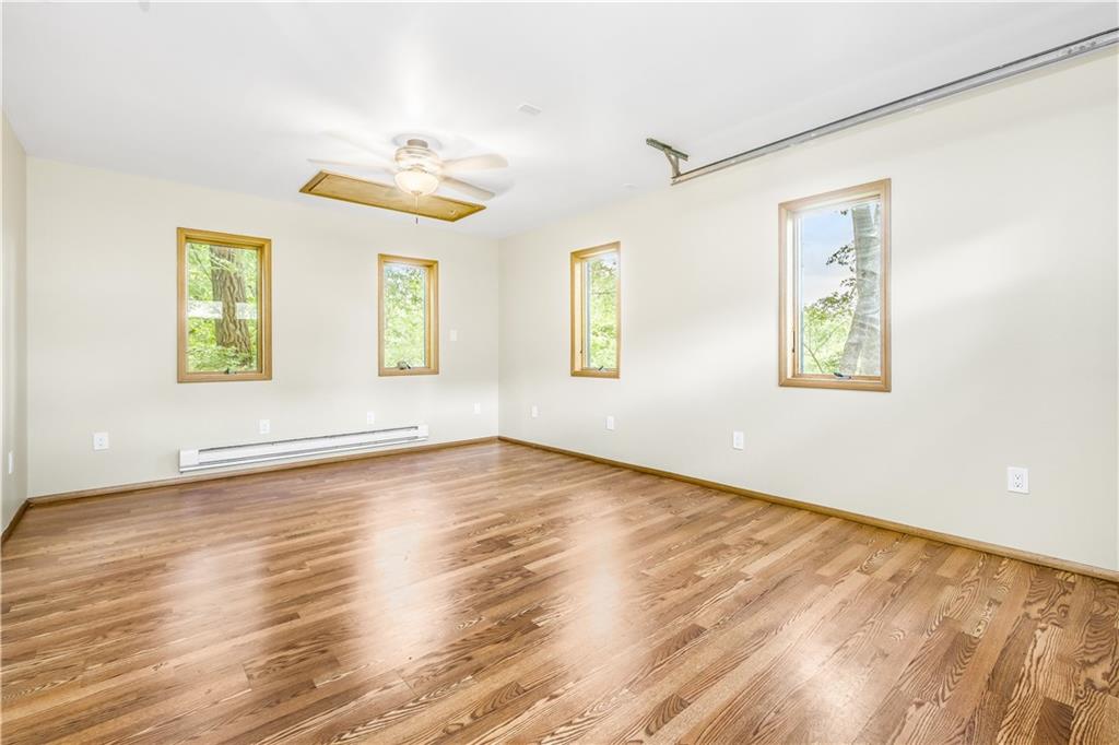 129 MacArthur Road Clairton, PA 15025 - Photo 21 of 25 The Shed is a Finished Space with Heat, Ceiling Fan and Natural Light! Perfect for an Office, Workout Room, Art Studio or Backyard Entertainment