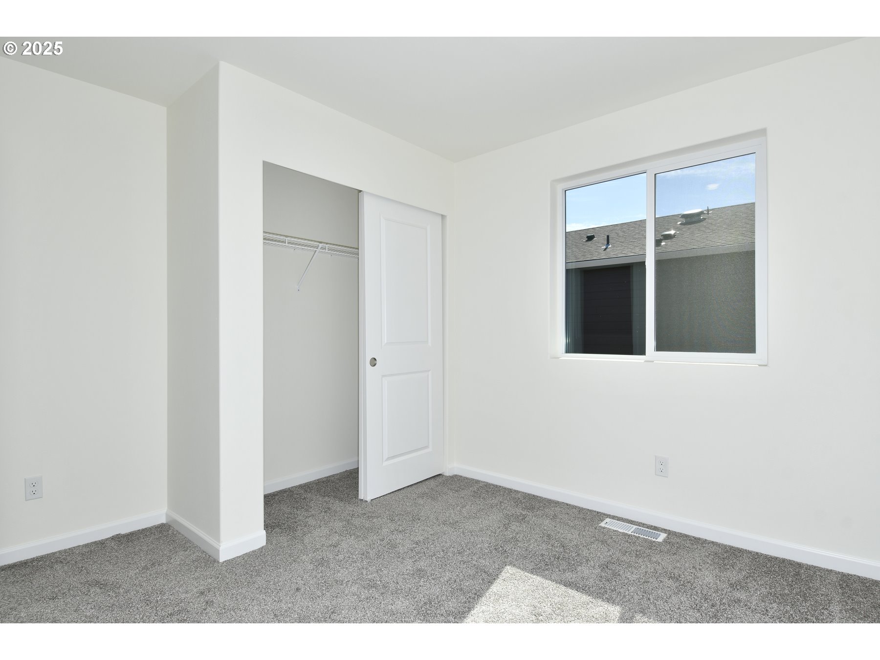 3933 Southwest Duniway Lane Gresham, OR 97080 - Photo 18 of 24 an empty room with windows and closet
