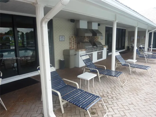 a lake view with a sitting space and a garden view