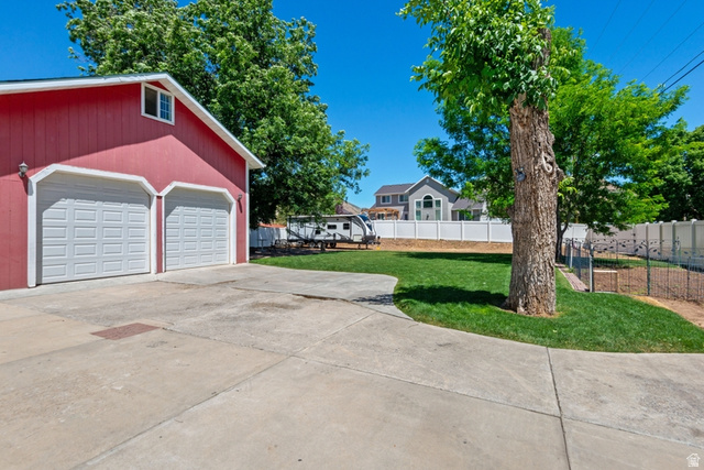 1214 North 300 West Mapleton, UT 84664 - Photo 29 of 33 Detached 25x25 two car detached garage with loft upstairs. Over size ceilings and insulated garage doors. - Walnut and Pecan Trees