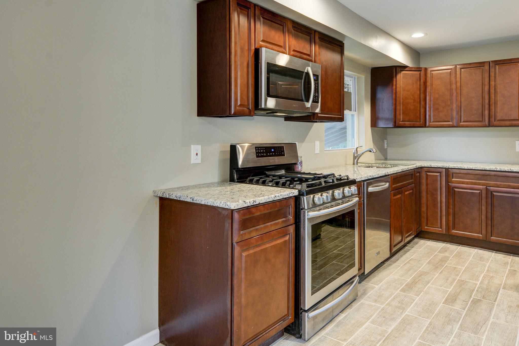 450 South Forklanding Road Maple Shade, NJ 08052 - Photo 5 of 43 Gas Range and Granite Counter Tops