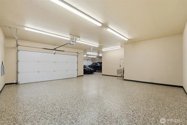 a view of a big room with closet and windows