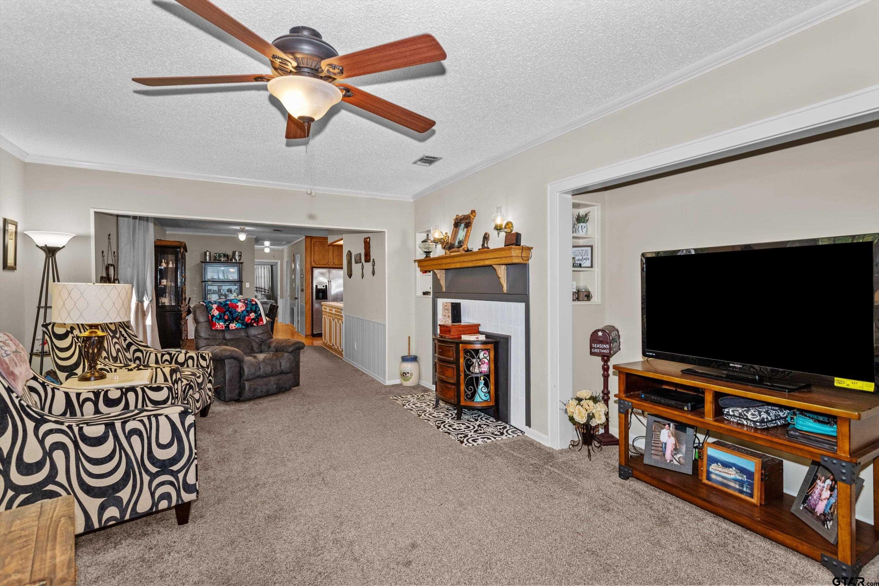 552 Highway 7 Crockett, TX 75835 - Photo 4 of 35 a living room with furniture and a flat screen tv