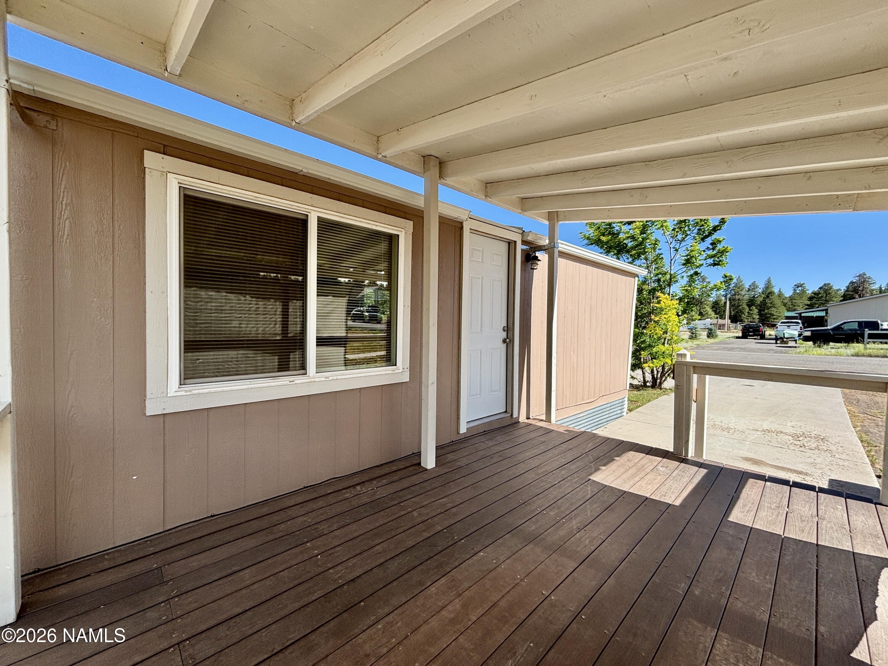 4805 South Thorn Road, Unit 1 Flagstaff, AZ 86005 - Photo 4 of 21 Inviting Porch with Composite Decking
