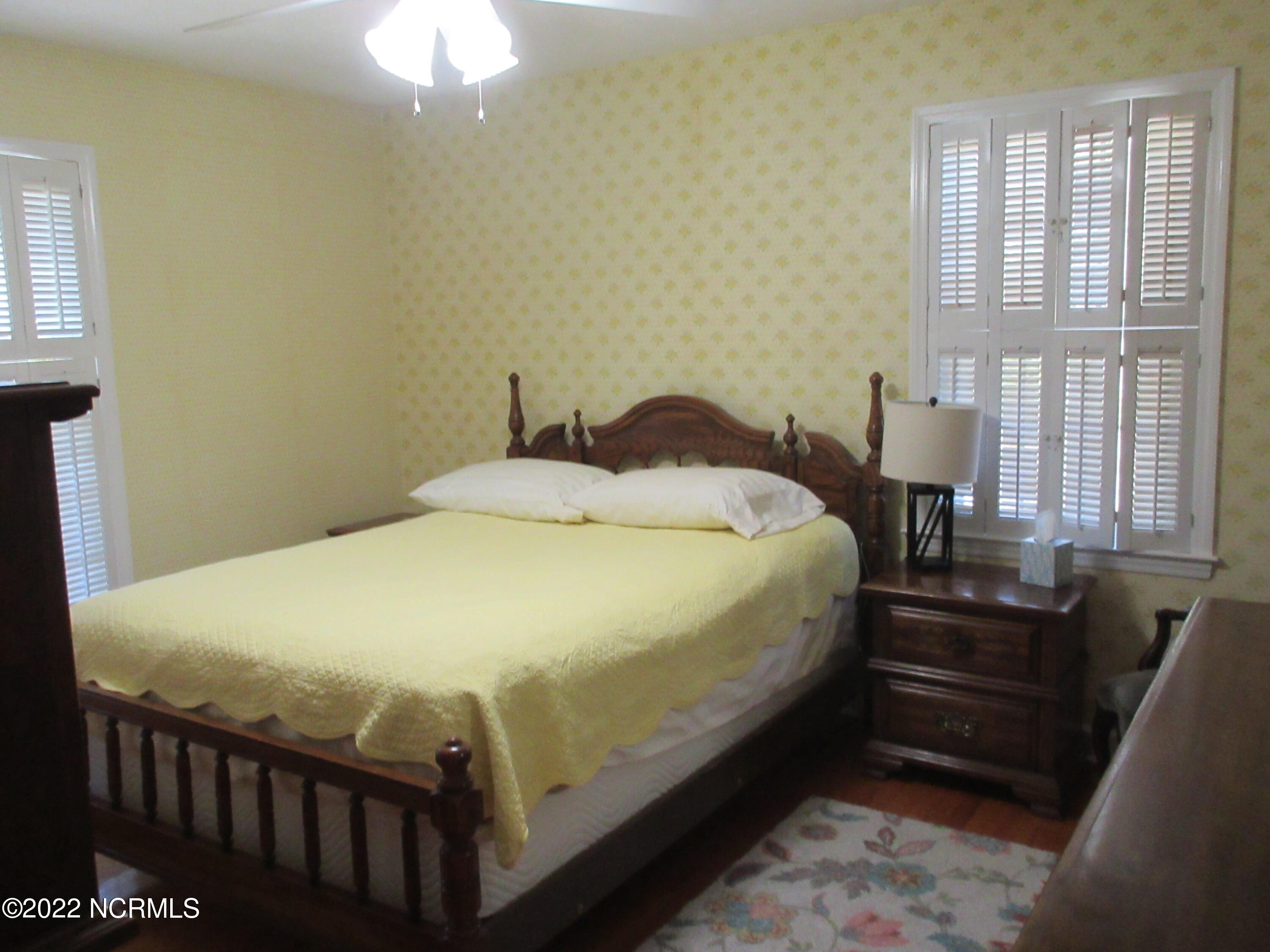 459 Howard Street Maxton, NC 28364 - Photo 12 of 23 bedroom 2 11.8 x 13 hardwood floors and ceiling fan