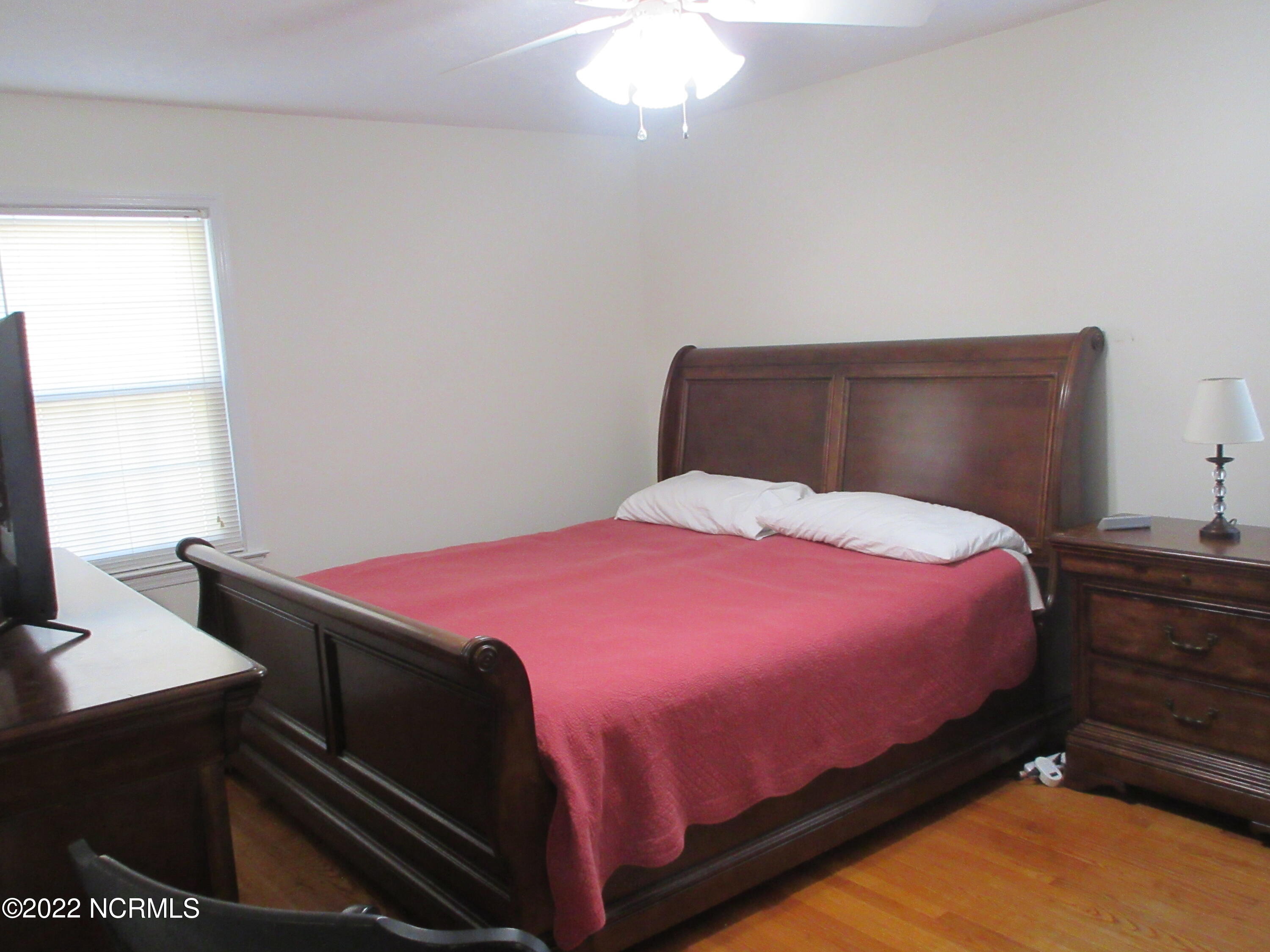 459 Howard Street Maxton, NC 28364 - Photo 13 of 23 master bedroom 15.3 x 11.8 hardwood floors and ceiling fan
