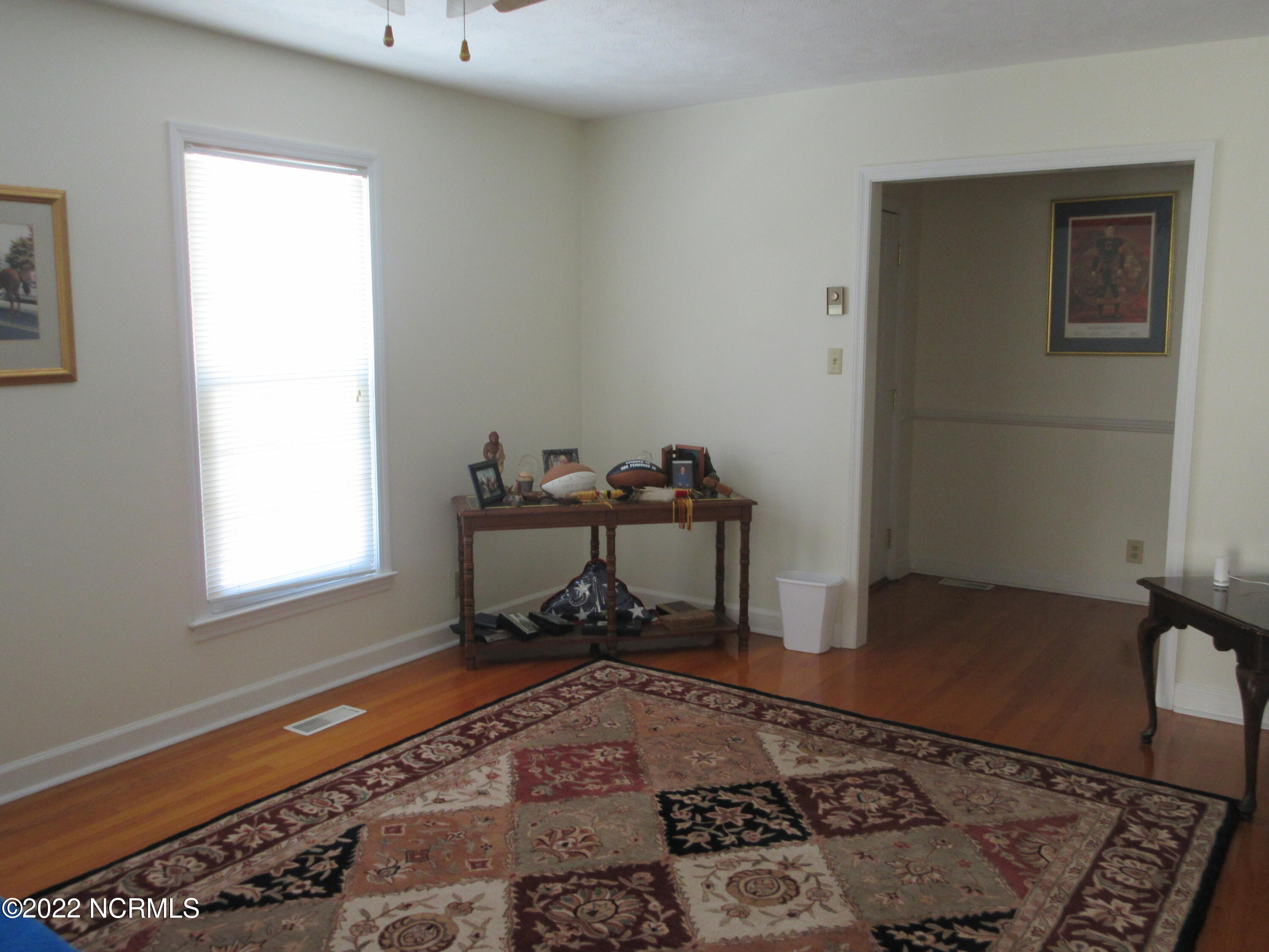 459 Howard Street Maxton, NC 28364 - Photo 2 of 23 living room 12.3 x 19 hardwood floors