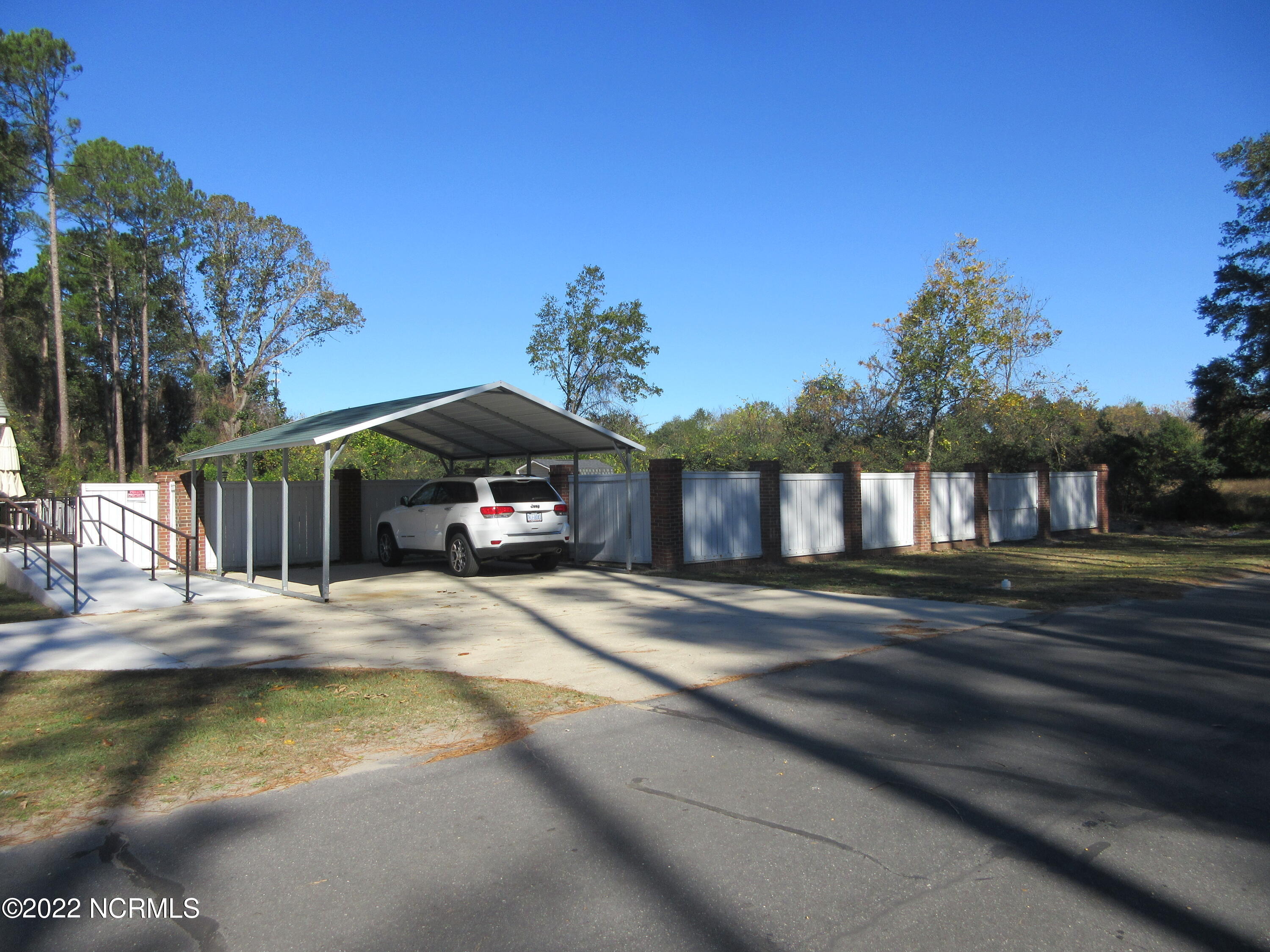 459 Howard Street Maxton, NC 28364 - Photo 21 of 23 view 2 of carport and back yard
