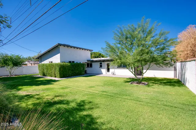 a house view with a garden space