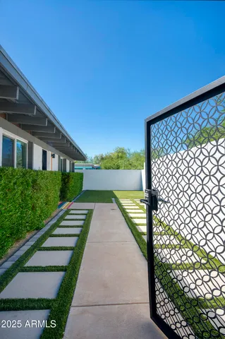 a view of swimming pool with outdoor seating
