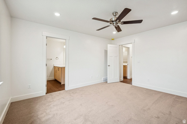 1627 North Angel Street Layton, UT 84041 - Photo 11 of 39 Unfurnished bedroom featuring ensuite bathroom, dark carpet, a ceiling fan, and recessed lighting