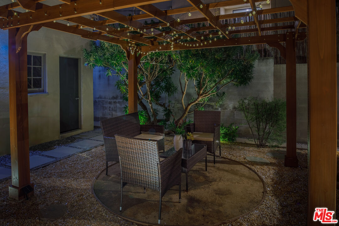 152 South Roxbury Drive, Unit 6 Beverly Hills, CA 90212 - Photo 51 of 51 a view of backyard with patio