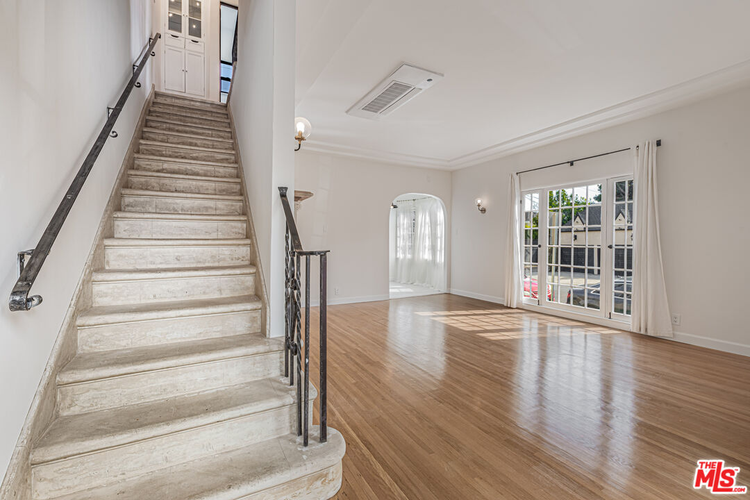 152 South Roxbury Drive, Unit 6 Beverly Hills, CA 90212 - Photo 7 of 51 a view of an entryway with wooden floor