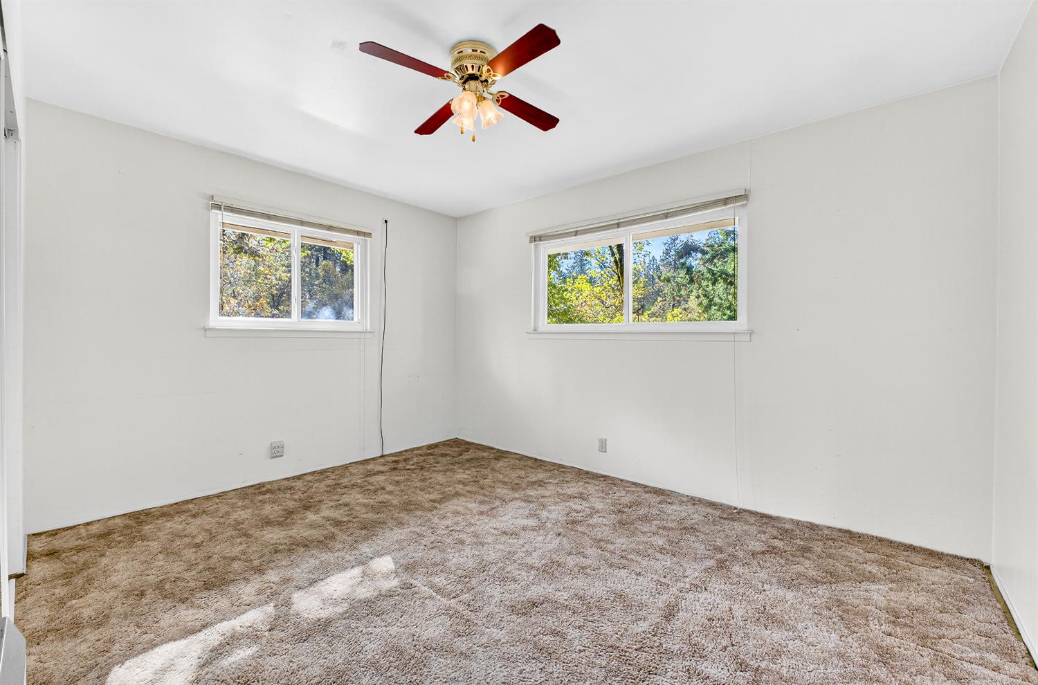 1130 Sage Road Colfax, CA 95713 - Photo 18 of 77 a view of room with window and ceiling fan