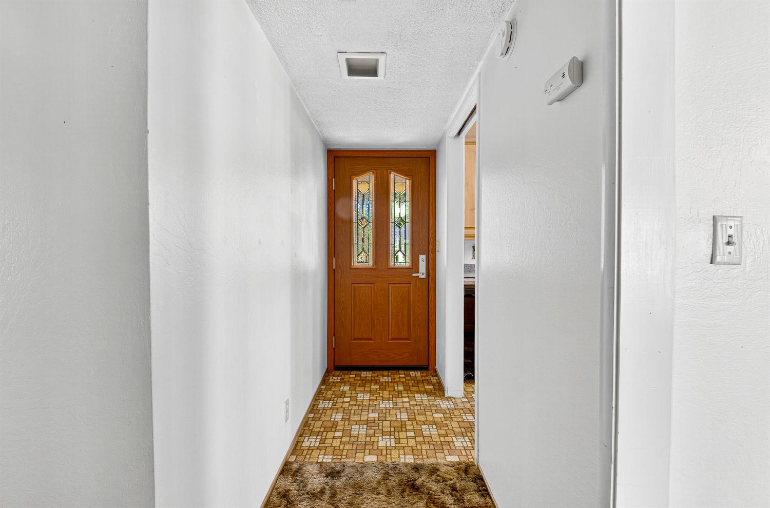 1130 Sage Road Colfax, CA 95713 - Photo 20 of 77 a view of hallway with wooden floor and a bathroom