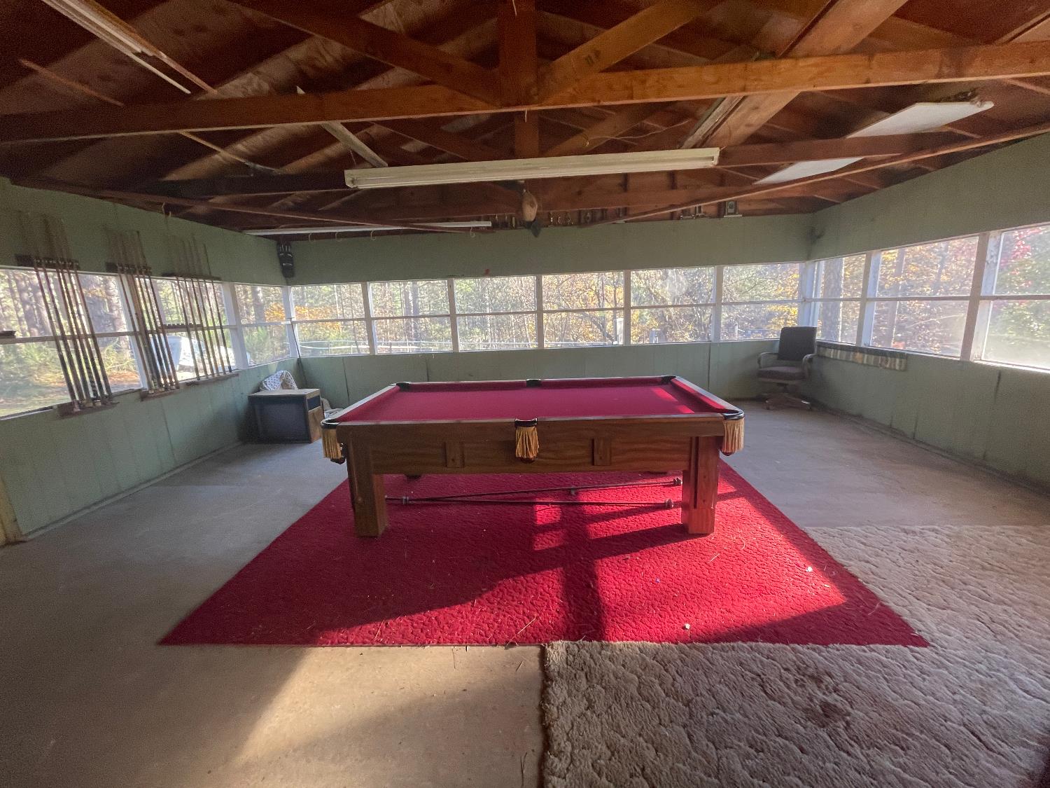 1130 Sage Road Colfax, CA 95713 - Photo 40 of 77 Game/bonus room that comes off of the garage with windows to view the property