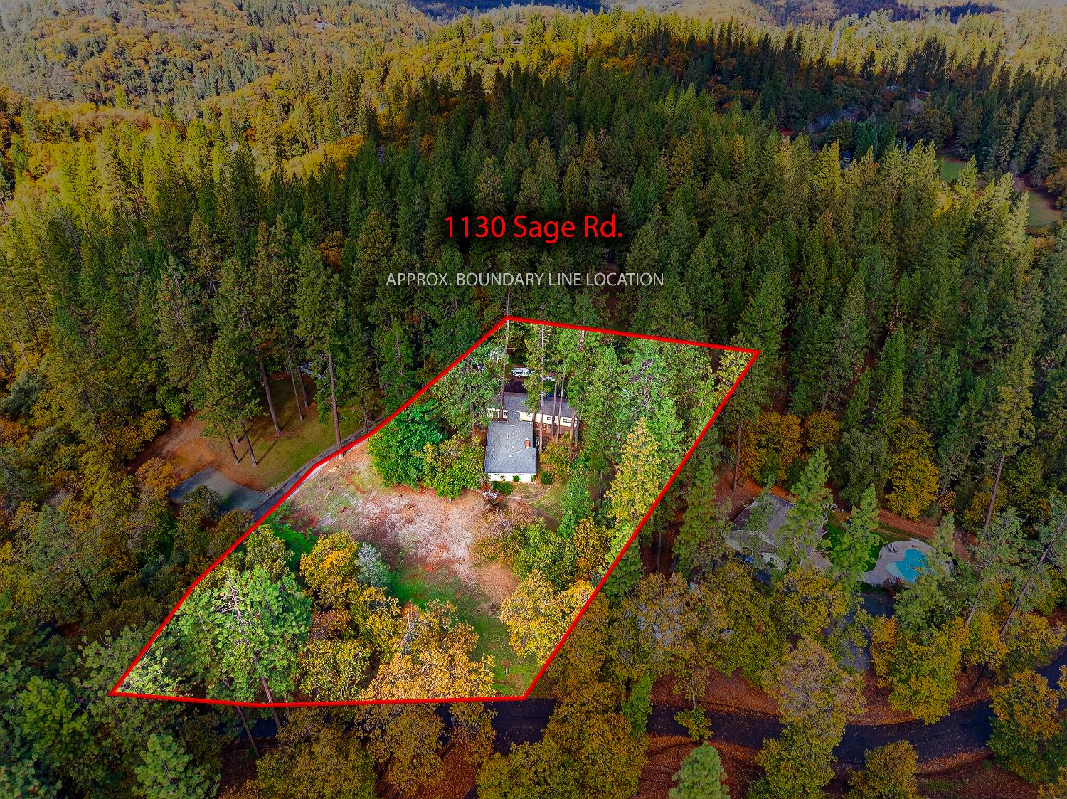 1130 Sage Road Colfax, CA 95713 - Photo 48 of 77 an aerial view of a house with a garden and swimming pool