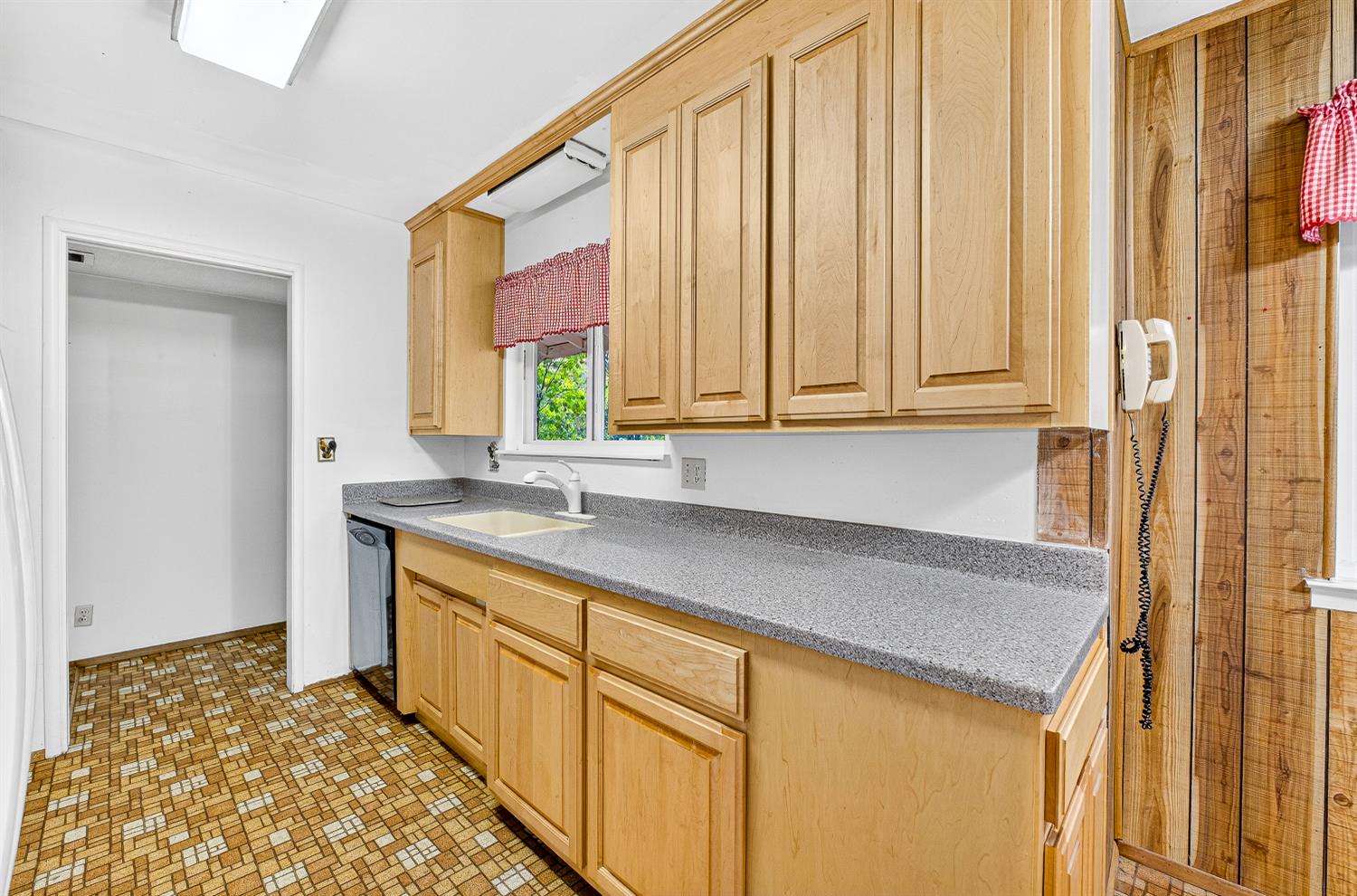 1130 Sage Road Colfax, CA 95713 - Photo 10 of 77 a kitchen with stainless steel appliances granite countertop a sink and a cabinets
