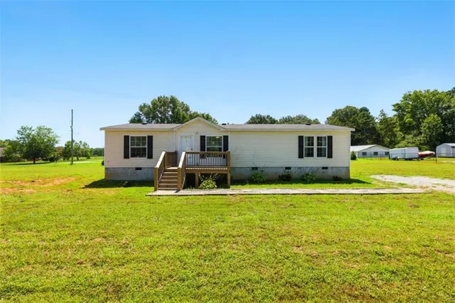 a view of a house with a patio