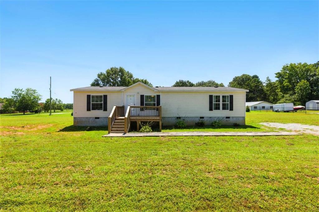 120 Beck Road Mount Airy, GA 30563 - Photo 1 of 30 a view of a house with a patio
