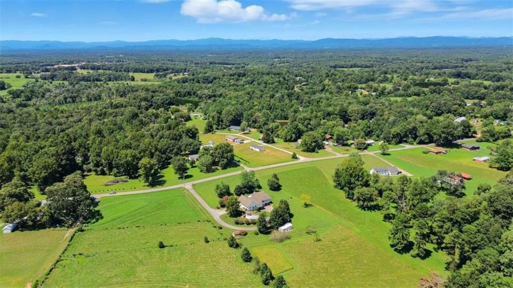 120 Beck Road Mount Airy, GA 30563 - Photo 11 of 30 an aerial view of a houses with a yard