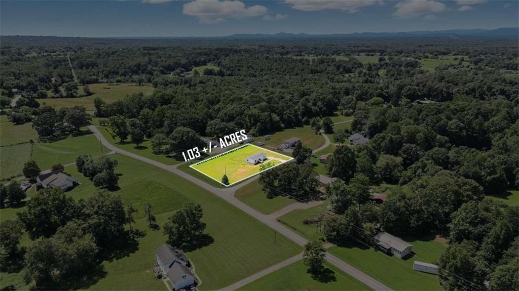 120 Beck Road Mount Airy, GA 30563 - Photo 20 of 30 an aerial view of a house with a yard