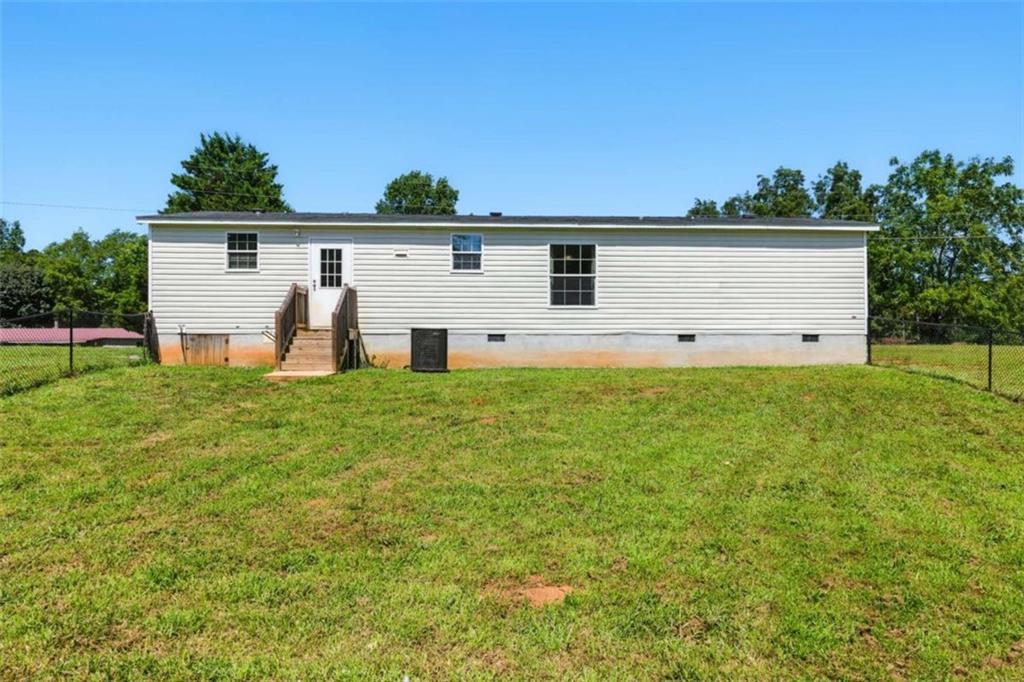 120 Beck Road Mount Airy, GA 30563 - Photo 29 of 30 a view of a house with a yard