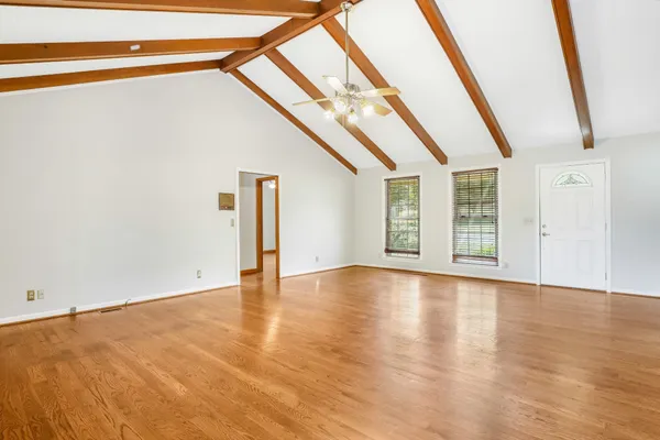 a view of an empty room with a window