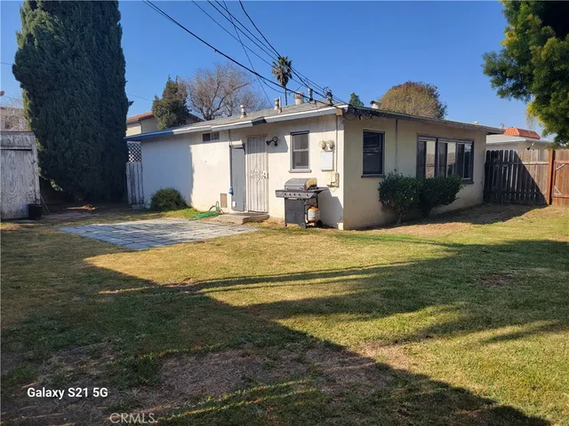 a view of a house with a swimming pool