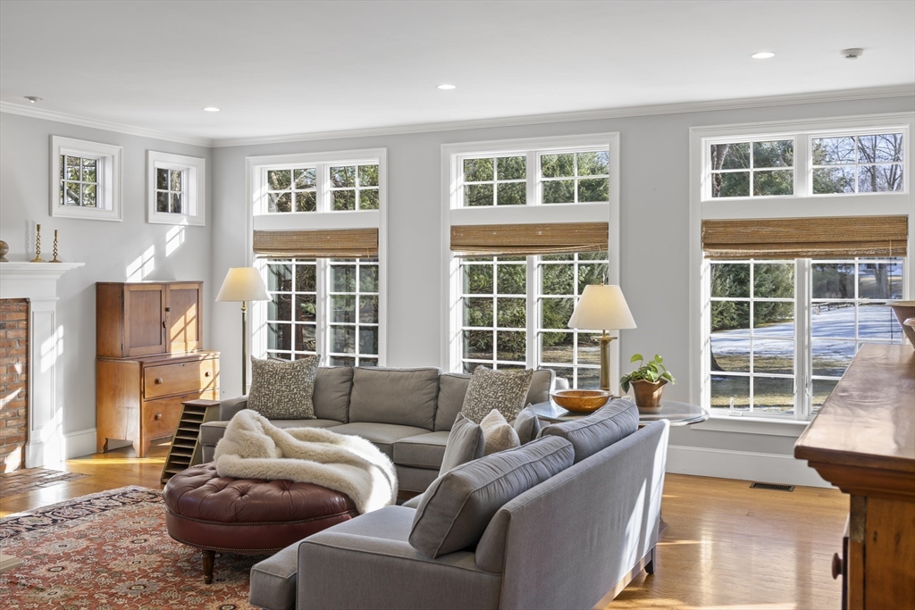 135 Plympton Road Sudbury, MA 01776 - Photo 7 of 42 a living room with furniture and windows