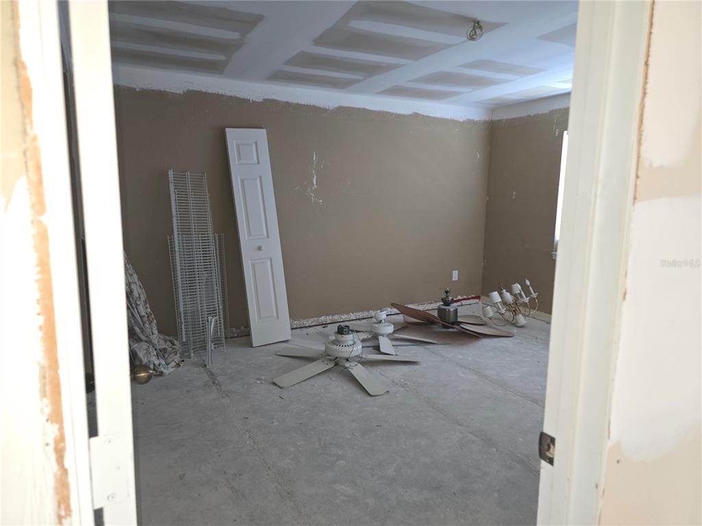 175 Kings Highway, Unit C8 Punta Gorda, FL 33983 - Photo 9 of 20 a view of a room with chairs