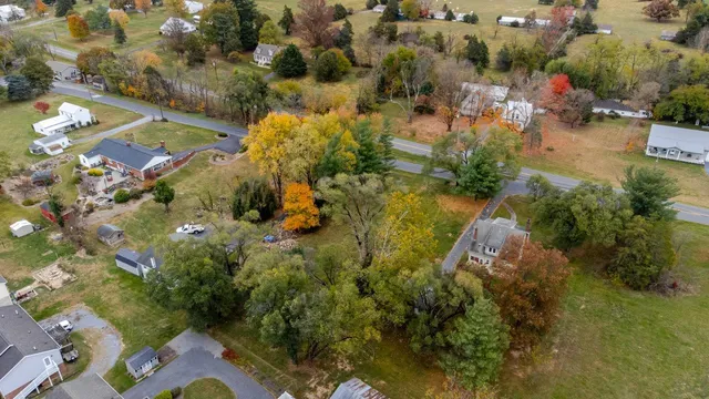 an aerial view of residential house with outdoor space