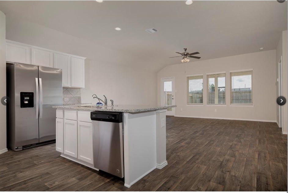 24306 Winchelsea Ln Spring Spring, TX 77389 - Photo 6 of 25 Open concept living and kitchen combo with dining nook