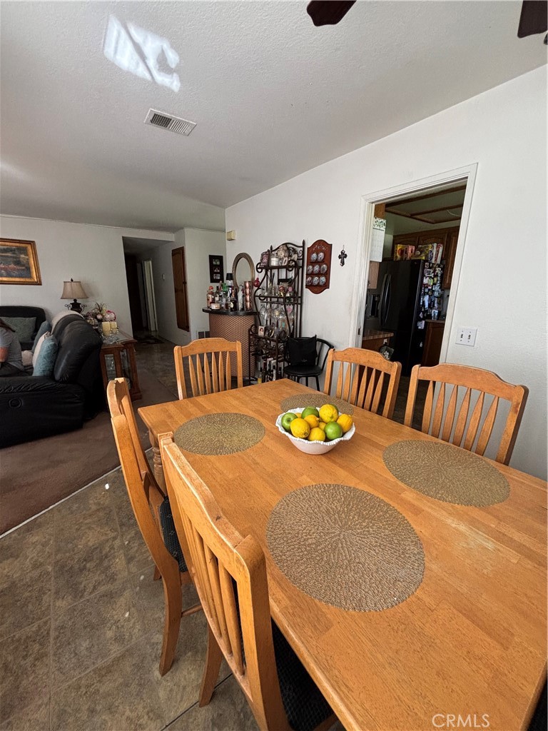 107 East Baseline Road San Dimas, CA 91773 - Photo 11 of 52 a view of a dining room with furniture