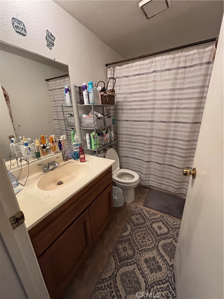 107 East Baseline Road San Dimas, CA 91773 - Photo 19 of 52 a bathroom with a sink toilet and shower