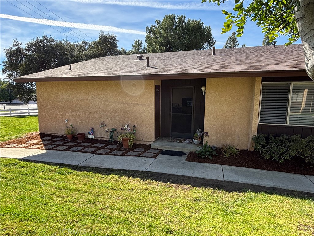 107 East Baseline Road San Dimas, CA 91773 - Photo 2 of 52 a view of house with garden space and swimming pool